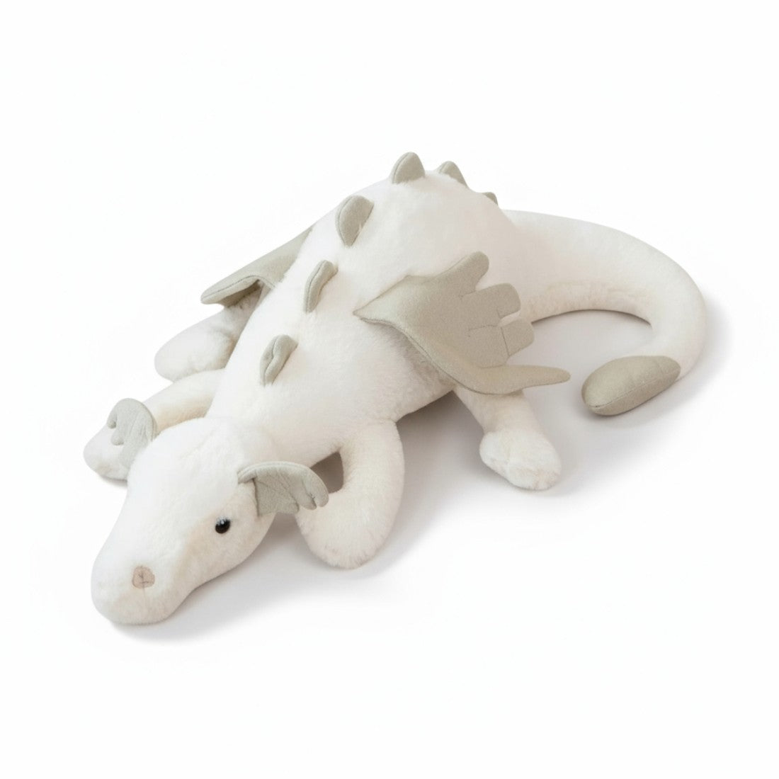 Dragon en peluche aux couleurs pastel