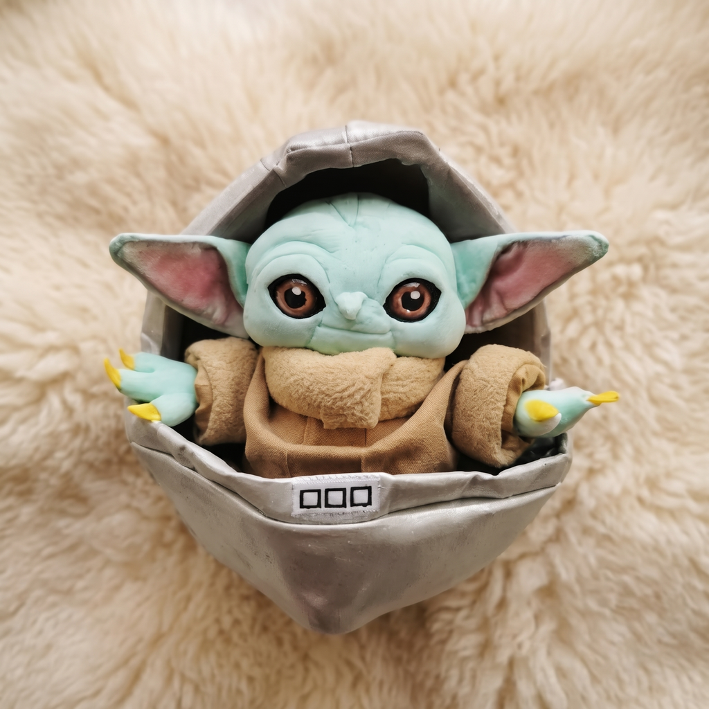 Peluche Baby Yoda dans son Berceau 23cm